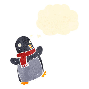retro cartoon christmas penguin with thought bubble