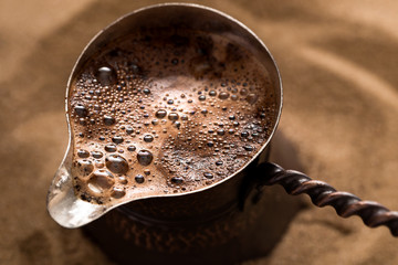 Coffee brewing in turkish pot