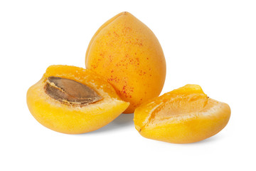 three apricot fruits isolated on white background