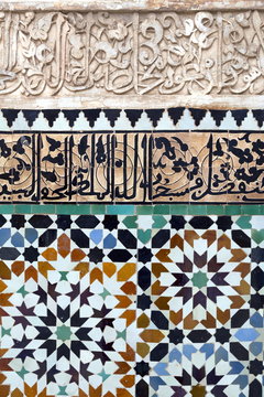 Traditional Moroccan Zallij tile work in the Ben Youssef Medersa, Marrakech, Morocco 