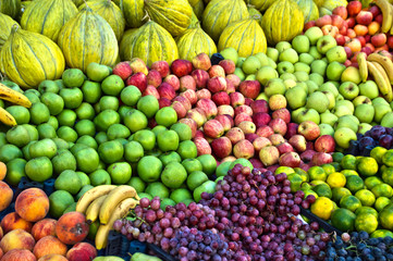 Naklejka na ściany i meble Variety of fresh organic fruits on the street stall