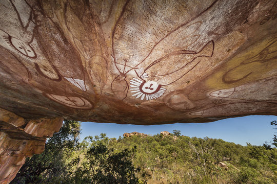 Aboriginal Wandjina cave artwork in sandstone caves at Raft Point, Kimberley, Western Australia