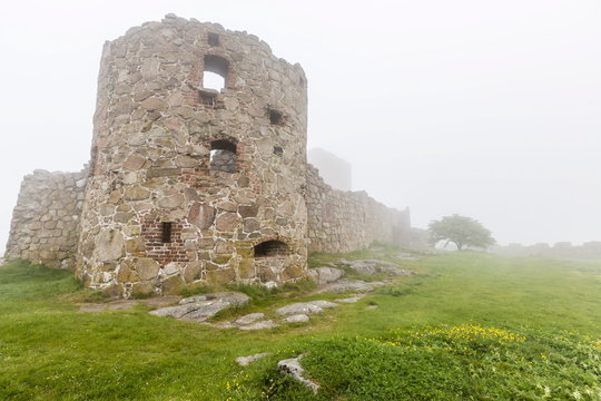 Fog shrouds Hammershus Castle on the most northerly tip of Bornholm, Denmark