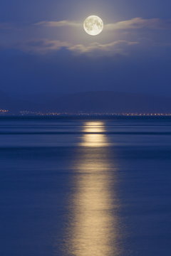 Full moon over the Mumbles, Swansea, Wales