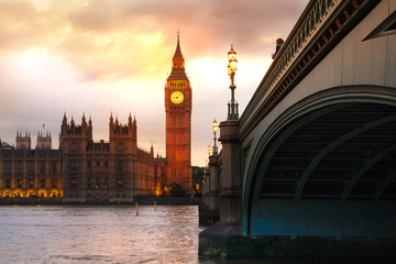 Naklejka na ściany i meble London sunset. Big Ben and houses of Parliament