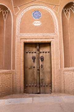 Typical door of an old house in Kashan, Iran.