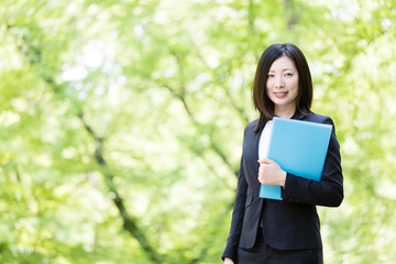 asian businesswoman in the park 