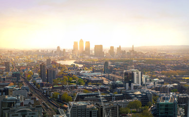 Fototapeta na wymiar LONDON, UK - APRIL 15, 2015: City of London panorama in sunset and first night lights.