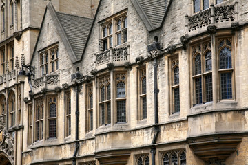 Fototapeta na wymiar Oxford gothic college building, bay windows overlooking street