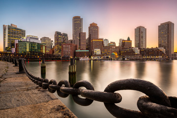 Boston skyline at sunset as viewed from Fan Pier Park.