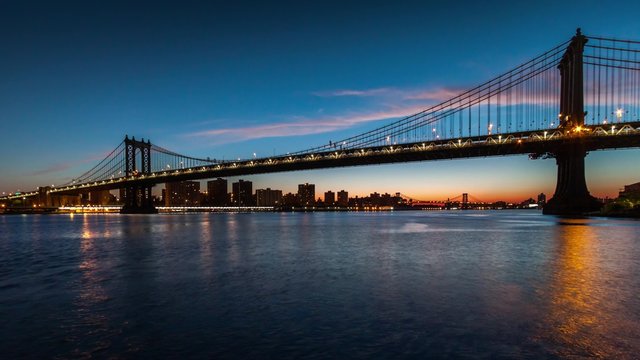 Manhattan Bridge sunrise timelapse made from Brooklyn Bridge Park in New York City