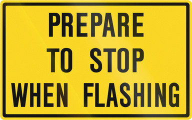 Canadian road warning sign - Prepare to stop when flashing. This sign is used in Ontario
