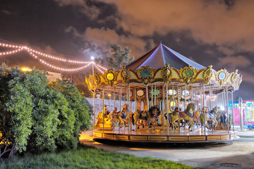 Vintage carousel at night