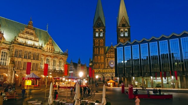 Market Square, City Hall and the Cathedral of Bremen, Germany at night. Time lapse