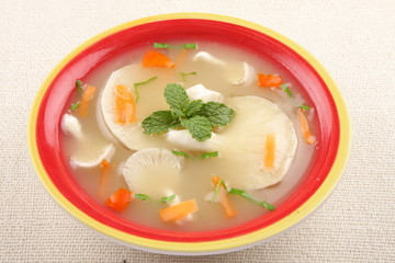 Healthy and tasty mushrooms soup with rice.