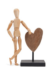Wooden mannequin with a big heart