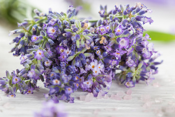 Lavender flowers on wooden table.