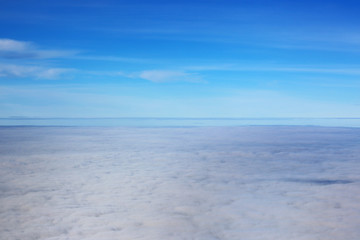 Fototapeta na wymiar clouds. view from the window of an airplane flying on the clouds