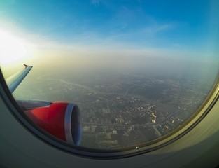 Classic image through aircraft window onto jet engine