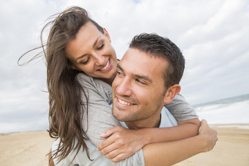 portrait of living young couple at the beach