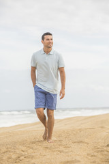 man walking on the beach