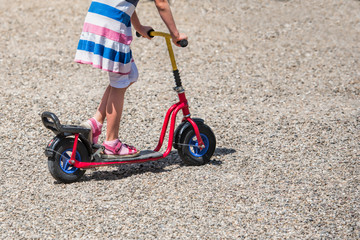 Children and scooter