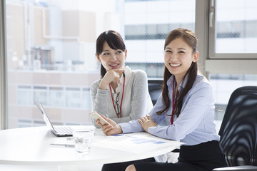 Women smile in the office