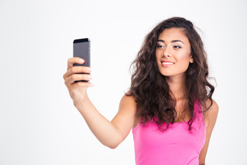 Fototapeta premium Woman making selfie photo on smartphone