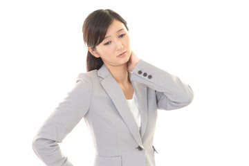肩こりに悩む女性