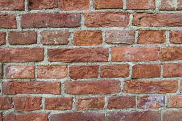 Masonry of the old red brick. Irregularities. Texture.
