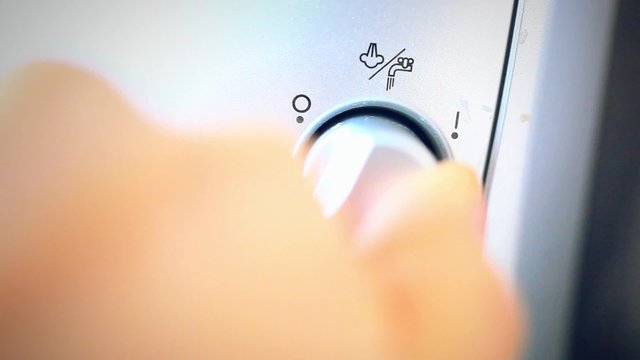 Hand turn on mode steam in coffee machine for milk whipped to a