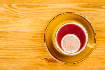 cup of tea on wooden background
