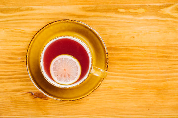 cup of tea on wooden background
