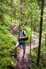 Obraz premium Teenager tourist on a mountain trail