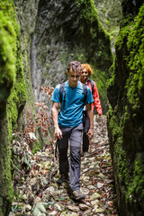 Mother and son on a canyon