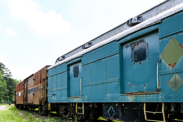 Fototapeta na wymiar Blue and Brown Train Cars