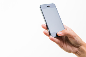 Female hand holding a smart phone, isolated on white