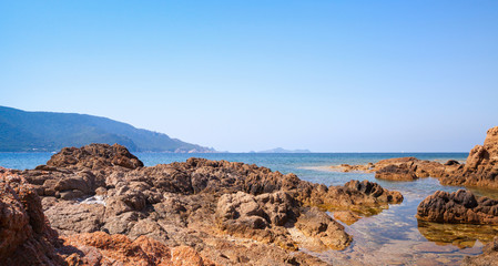 Fototapeta na wymiar Coastal rocks in the Mediterranean sea water
