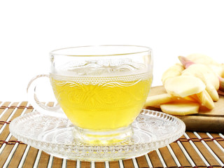 ginger tea in transparent cup selective focus