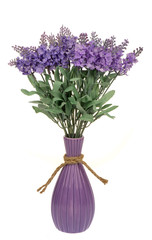 Artificial lawenda flowers in the vase isolated.