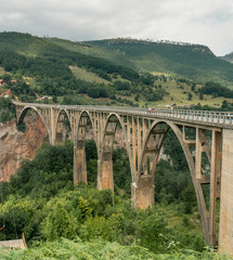 Fototapeta na wymiar Old big bridge in Durdevica and fantastic view Tara 