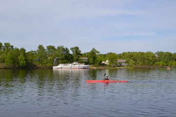 Fototapeta na wymiar Rowing on the river