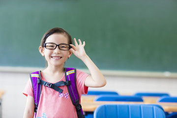 happy little girl in the classroom