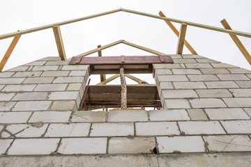 Roof of unfinished house in countryside