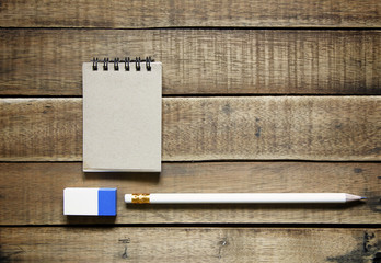 pencil and notepaper on wood, stationery office equipment  on wo