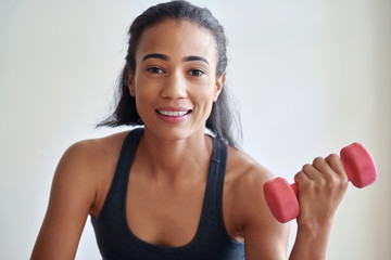 fitness female with dumbell