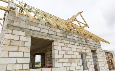 Roof of unfinished house in countryside