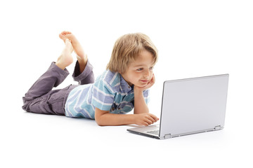 Boy working on laptop computer