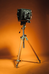 Vintage retro camera on a tripod