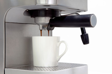 home coffee machine making espresso on a white background with c